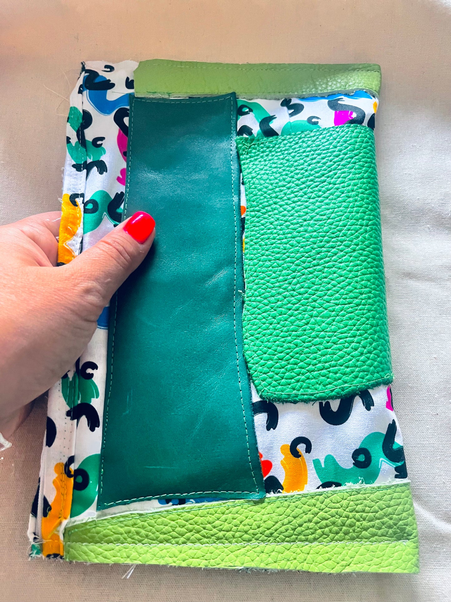 Green leather clutch