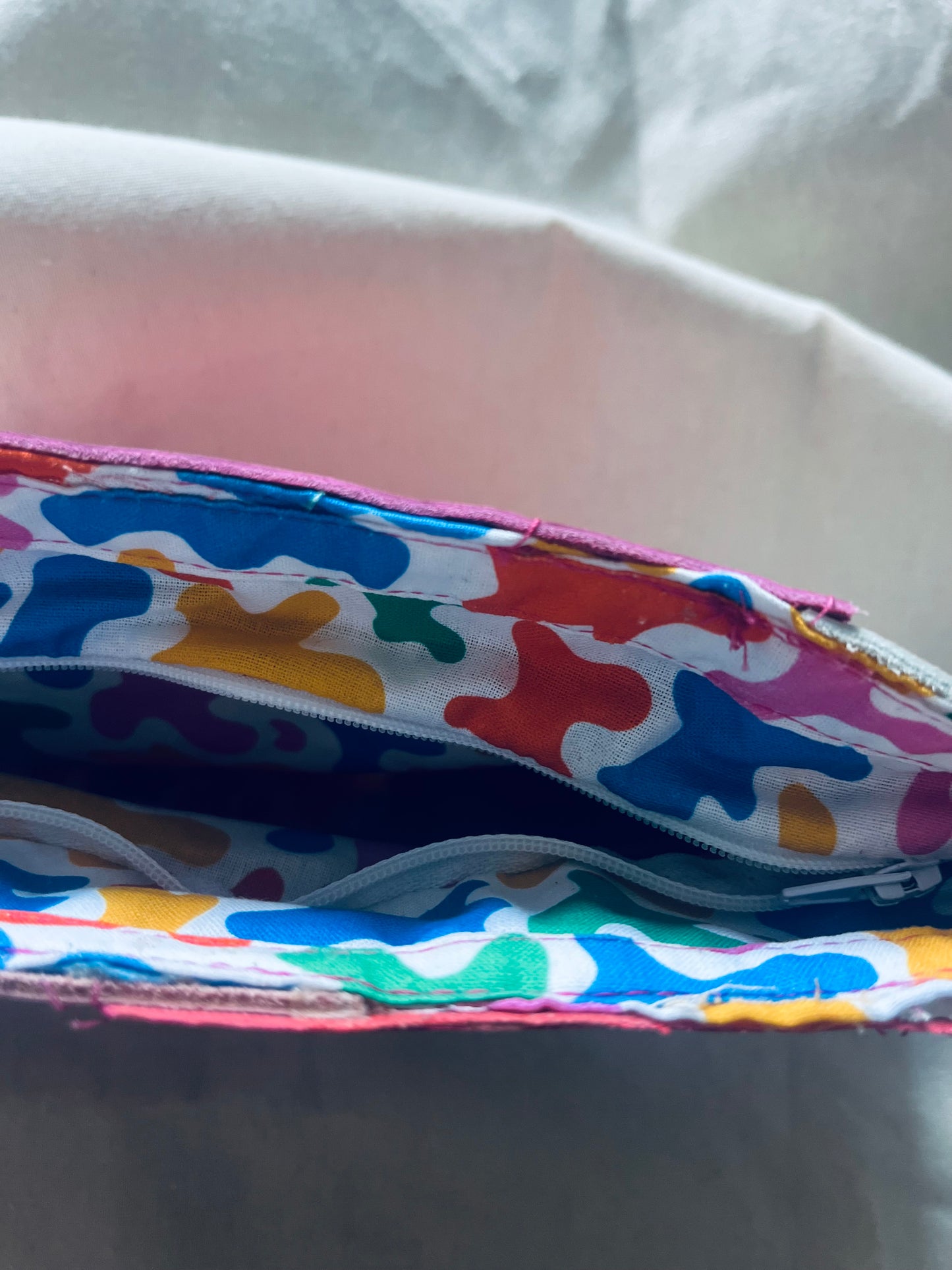 Pink and White leather clutch