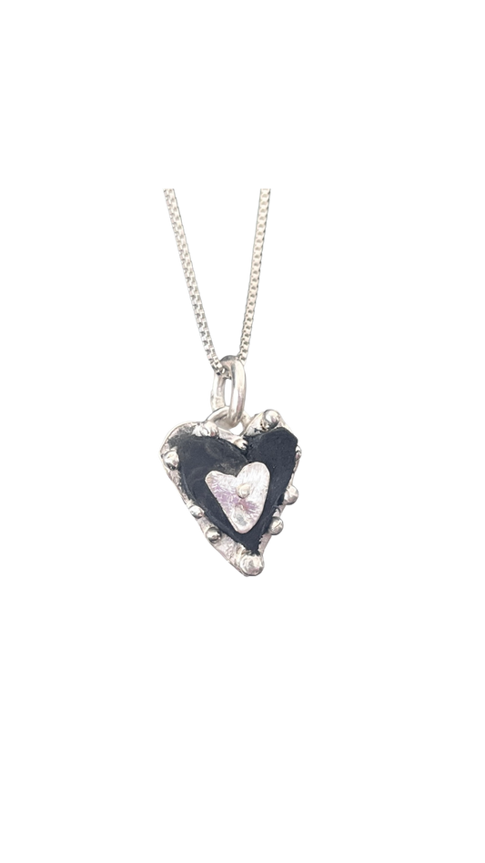 Leather hearts and silver pendants