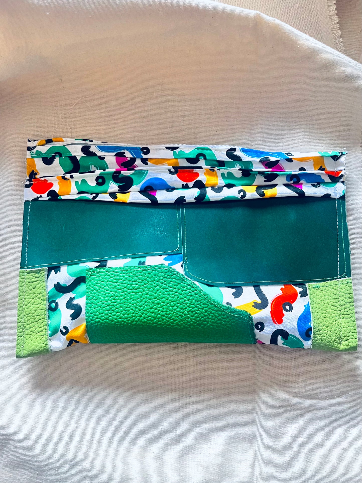 Green leather clutch