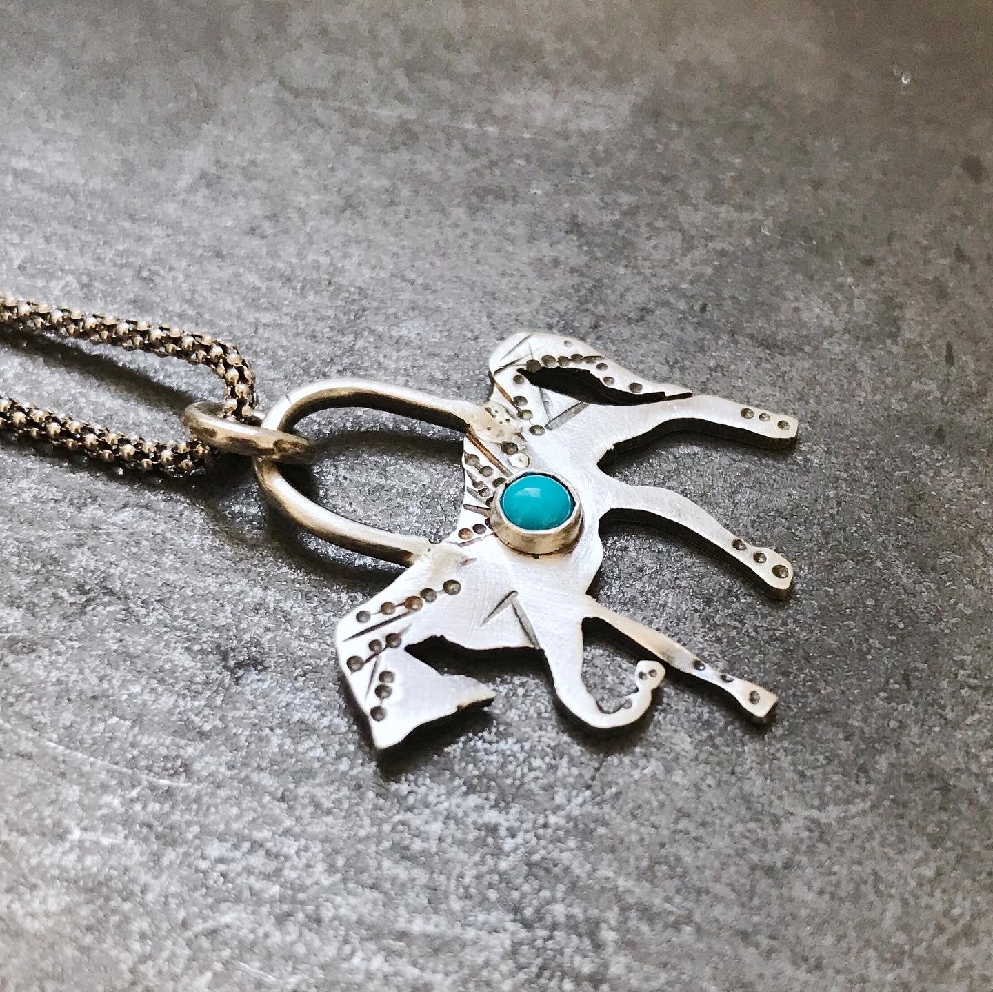 Turquoise stone horse pendant