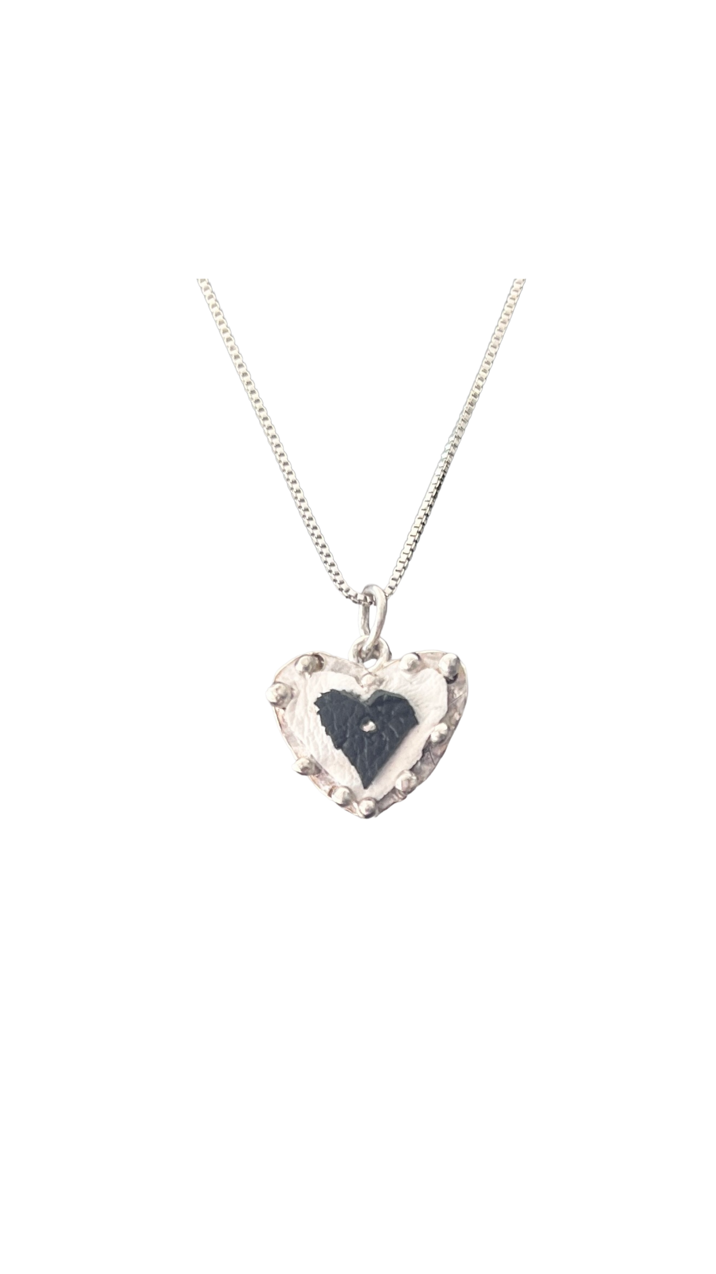 Leather hearts and silver pendants