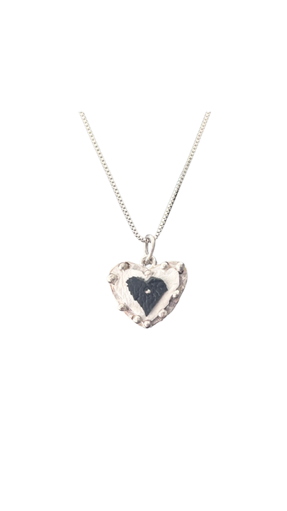 Leather hearts and silver pendants