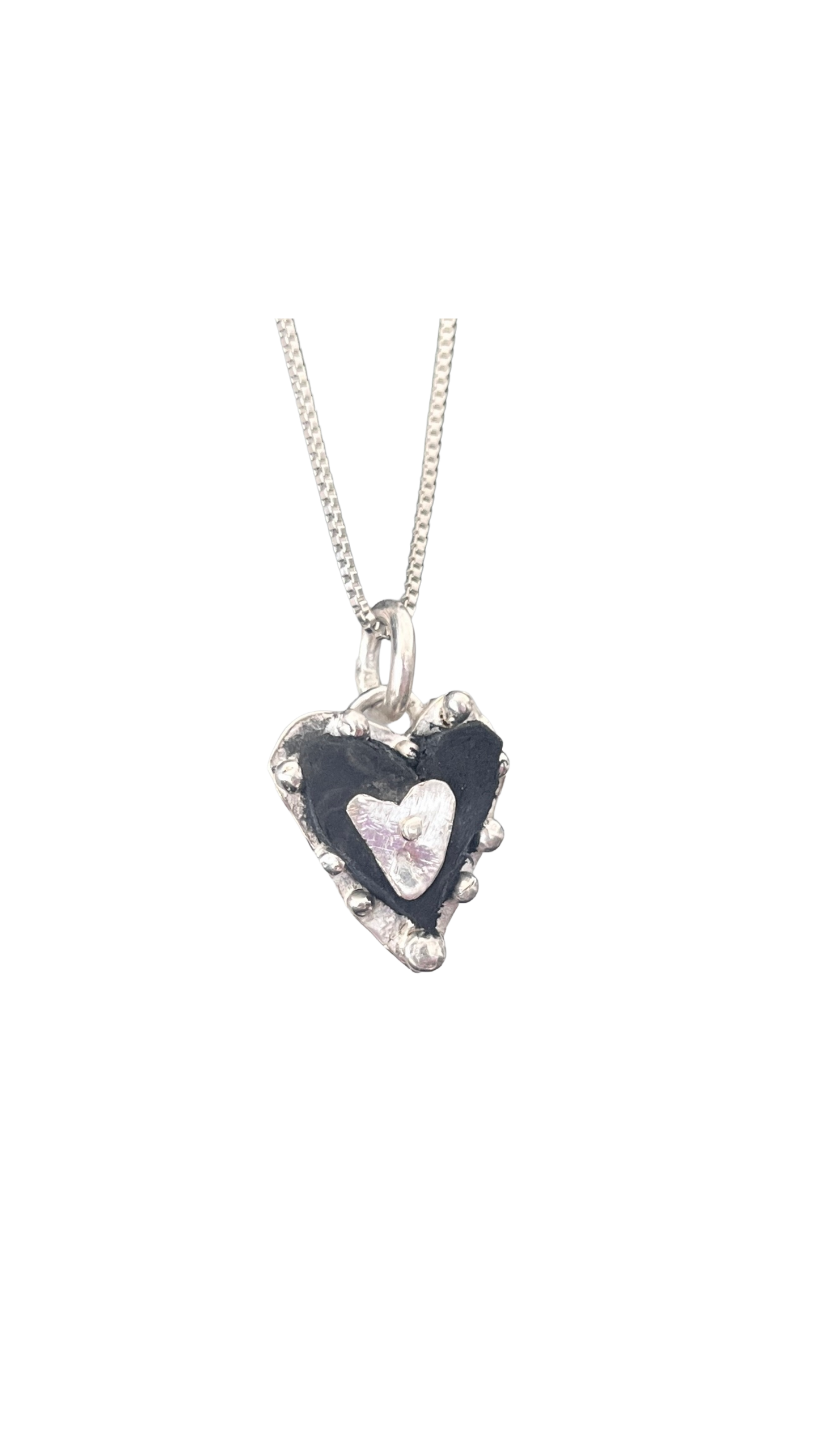Leather hearts and silver pendants
